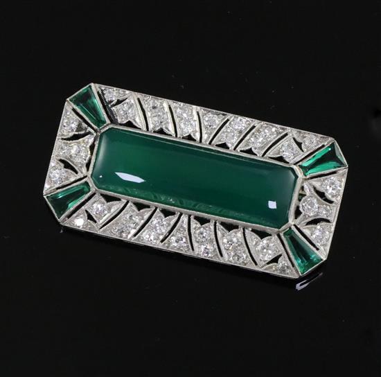 An Art Deco platinum?, chrysophase, SYNTHETIC? emerald and diamond millegrain set octagonal brooch, gross weight 10.3 grams.